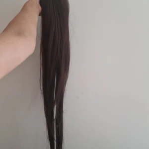 Pony tail choklad brun 60cm - Helt ny ponytail med värmetåligt hår (syntetisk men värmetåligt o trasselfritt permium hår) 