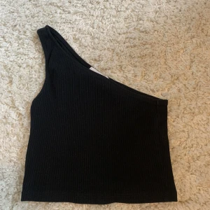 Top - Assymetrisk top