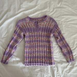 lila stickad tröja med trekvartslånga ärmar köpt secondhand 