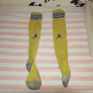 Yellow football socks  - Idk 