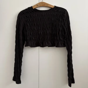 Kortare topp - Magtröja från H&M, använd fåtal gånger, jättefint skick