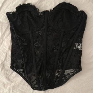 Korsett oanvänd - Storlek L oanvänd korsett me snörning i ryggen
