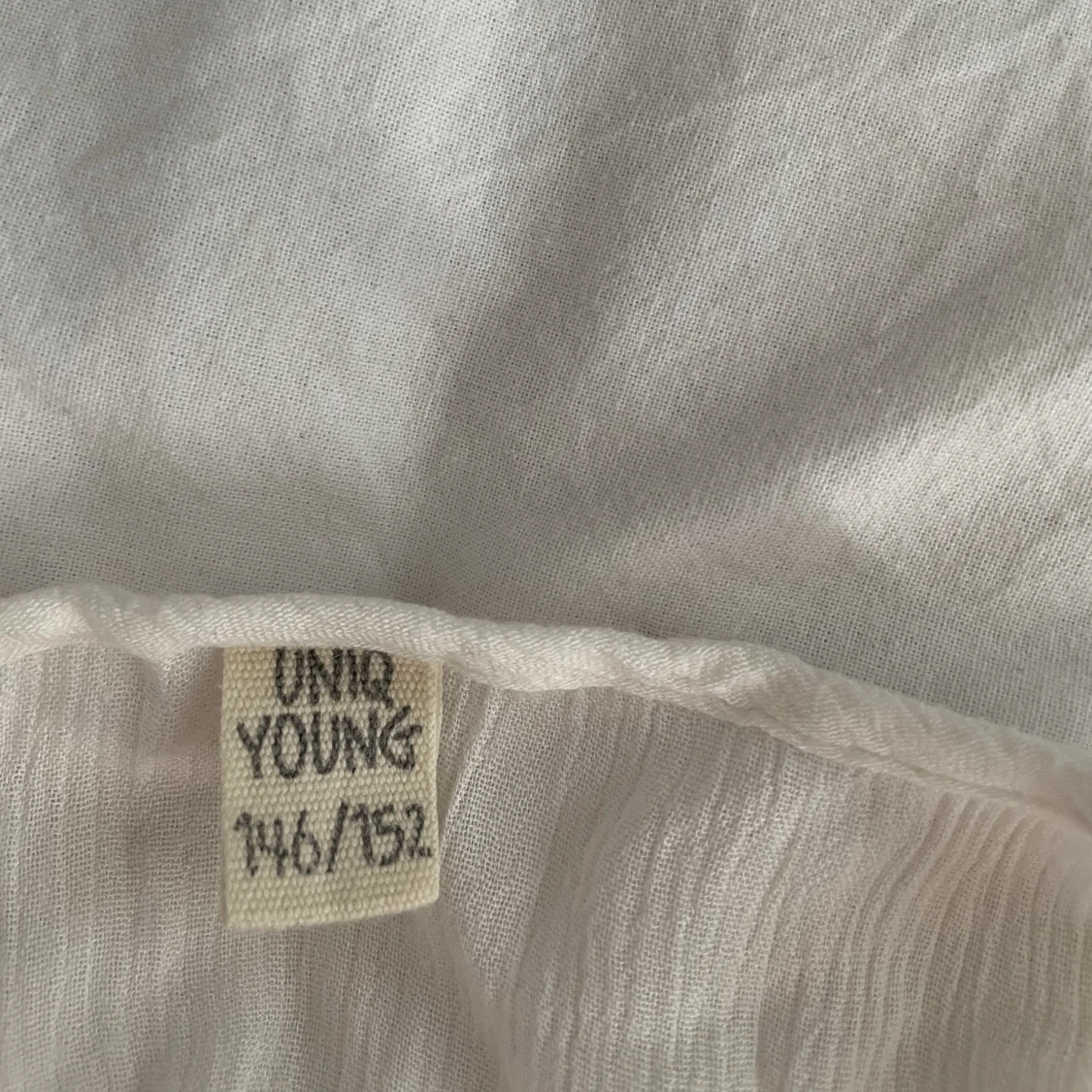 Ärmlös vit blus  - 90