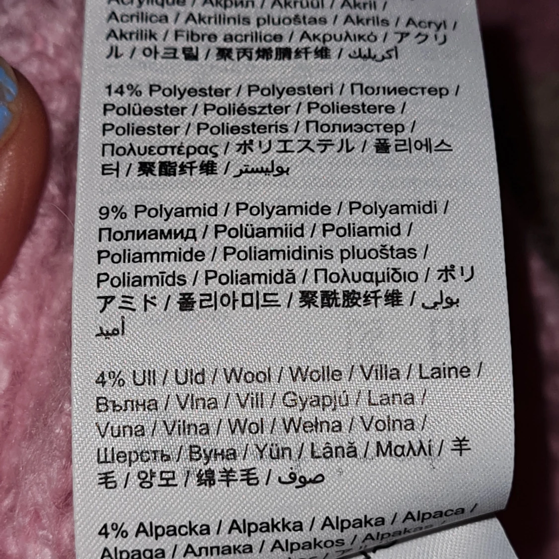 Stickad i pastellkulörer L - 91