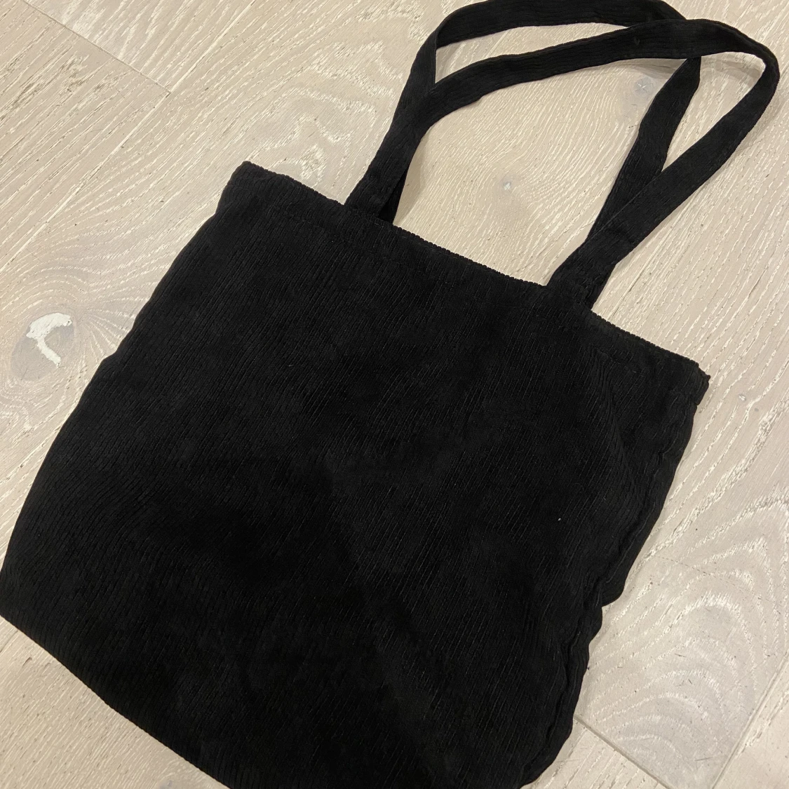 Svart manchester väska 