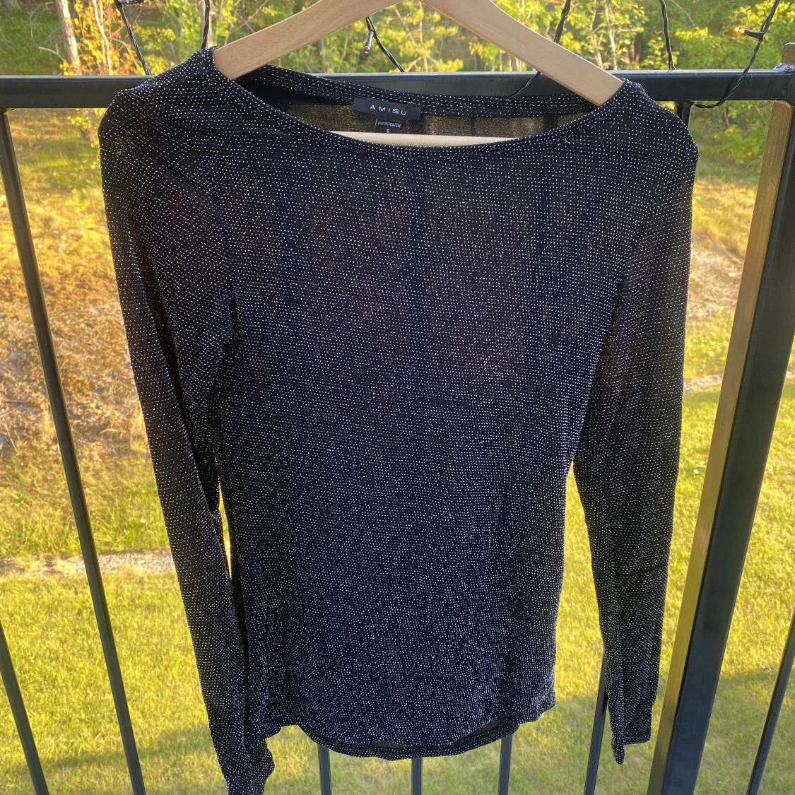 Glittrig långärmad topp