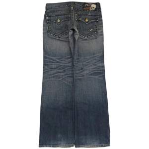 Baggy True religion jeans. Storlek 32x32, benöppning 22cm!! Använd gärna köp nu!