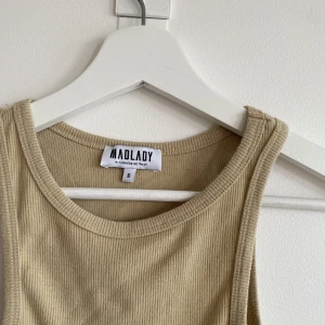 Linne - Bomullstyg, stretchig. Passar s/m/l. 