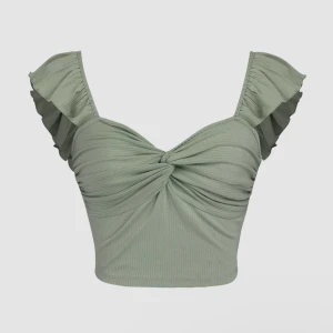 Grön topp  - Ett gulligt basicplagg som är guld värt i garderoben. 