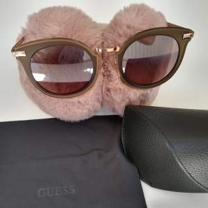 Olive green(ish) cat eye Guess sunglasses. Used once 