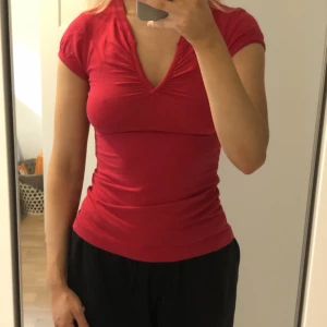 Rosa t-shirt  - Som nyskick 