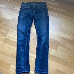 Nudie Tight Long John - Slimfit Nudie jeans i mycket bra skick. Storlek W30L32. Hör av er för fler bilder. 