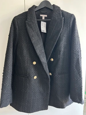 Tweed kavaj - Kavaj i tweed från H&M. Aldrig använd i stl. M. 