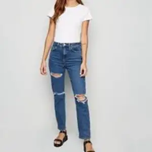New Look waist enhance mom jean in mid blue from New Look.