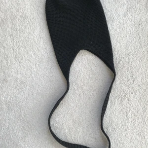 Virkad väska svart - Virkad väska i slittåligt material, lite mindre. 