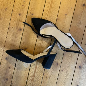Black heels, size 41  - Black high heels. Used quite a lot so they are quite wide but very comfortable. 