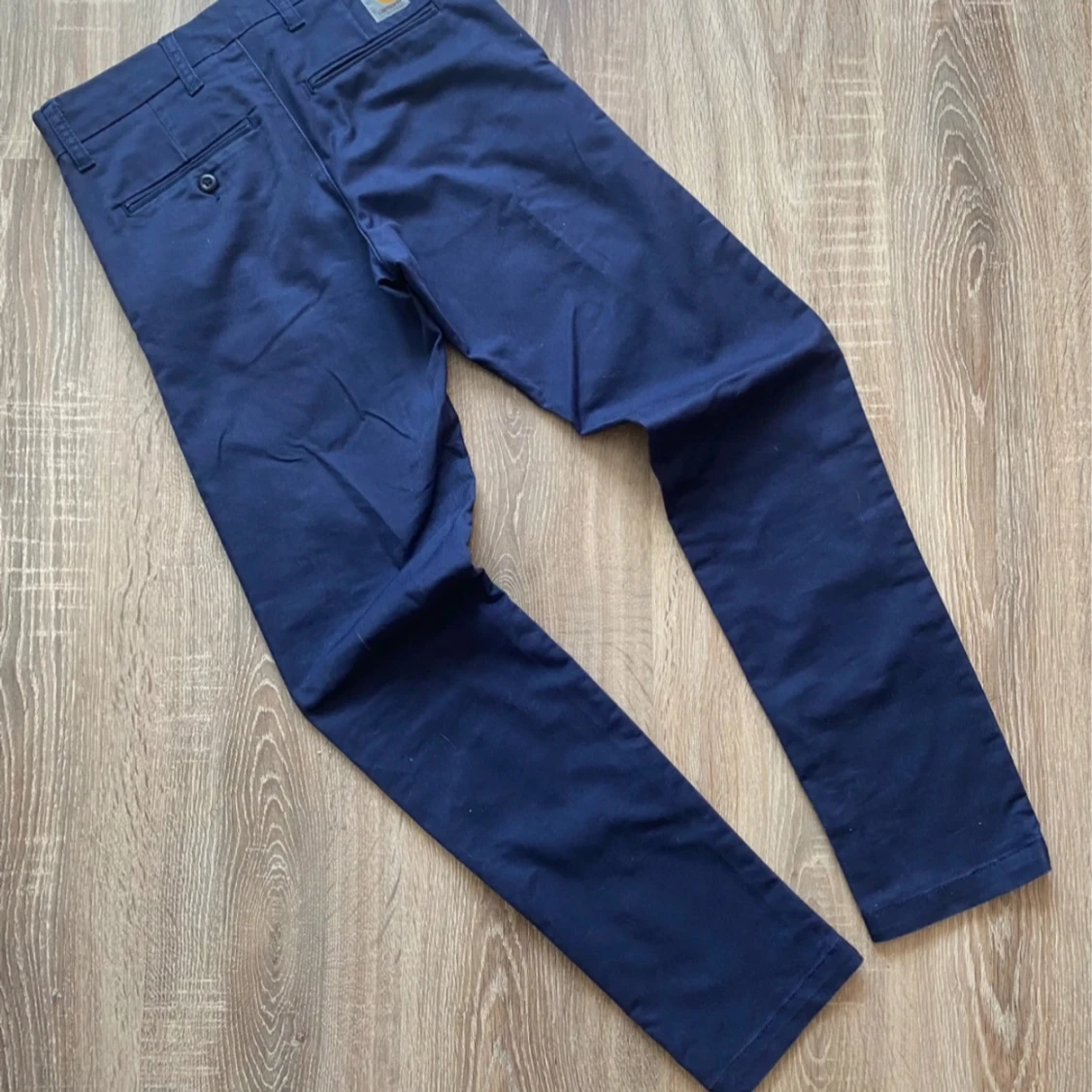 Carhartt chinos 27/30 marinblå