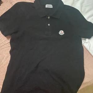 Polo monclare -  En polo monclare  