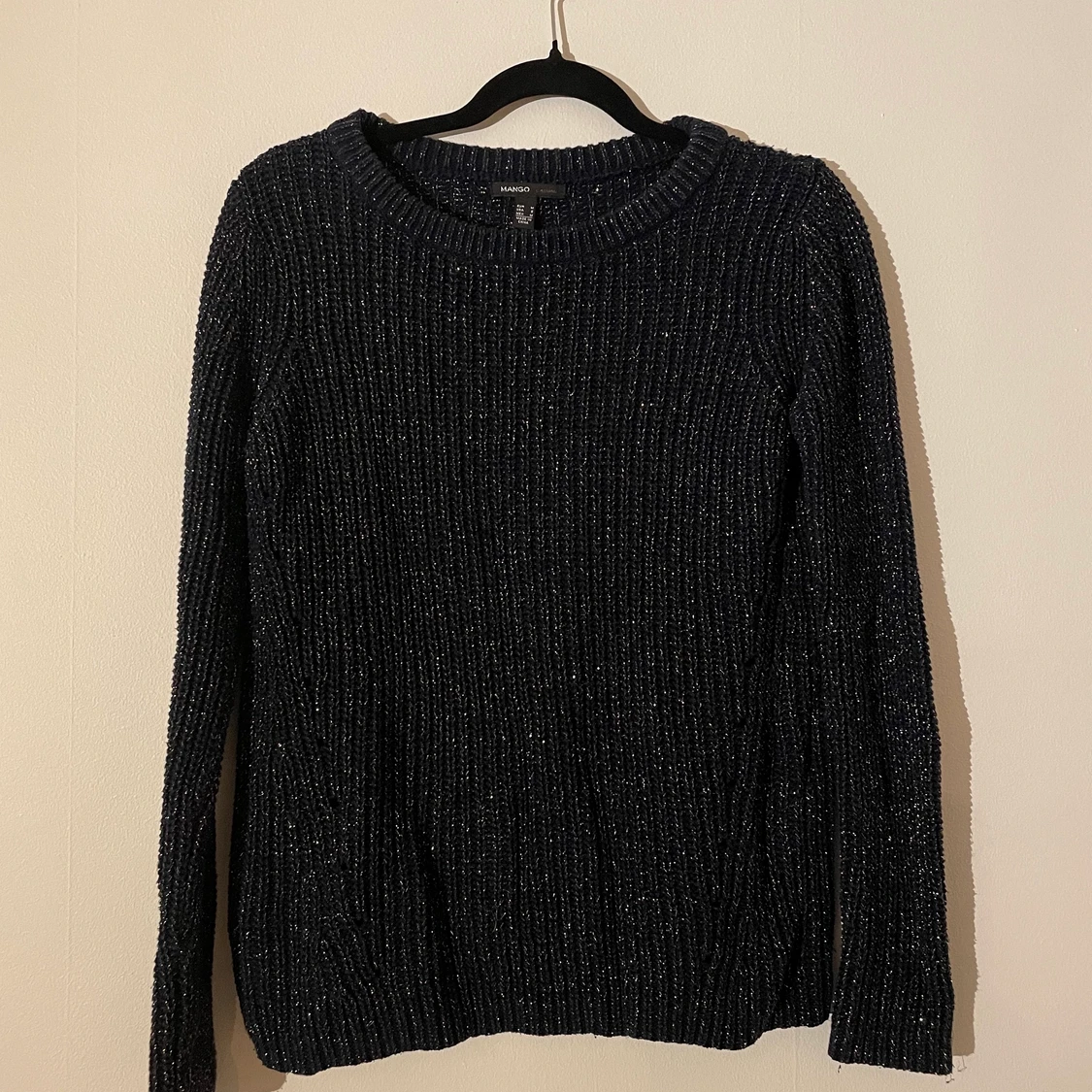 Stickad glittertröja