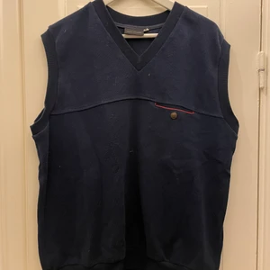 Blå väst - Snygg blå väst med ficka 