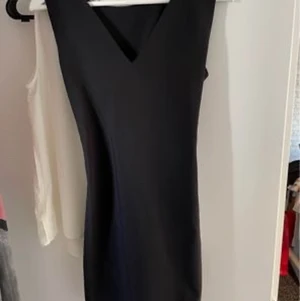 Den lilla svarta  - Svart klänning använd en gång 