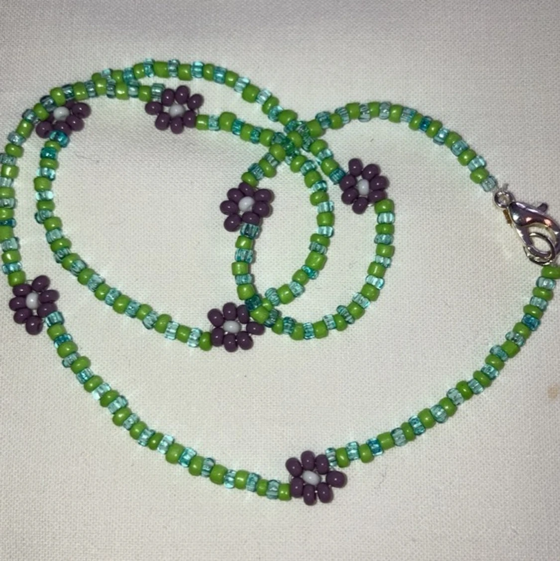 Halsband blommor - 91