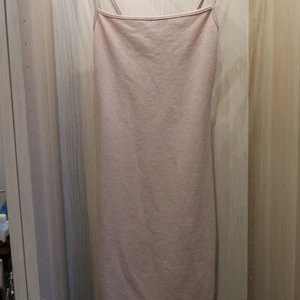 Klänning Nelly  - Figurnära klänning 