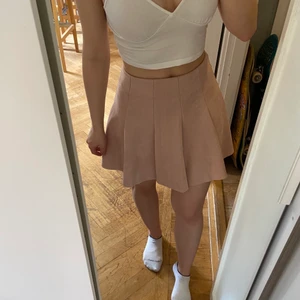 Soft fake leather pink skirt  - Worn 2-3 times, in great condition. Zip up on the back. Shipping not included. 