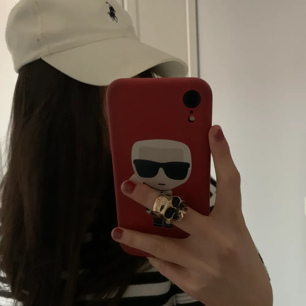 Vit keps med blå logga från Ralph Lauren. Accessoarer.