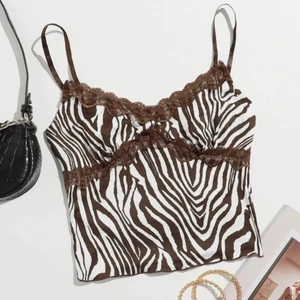 Zebra linne - Säljer det här superfina linnet med brunt zebramönter i storlek M. Helt oanvänt, endast provat. 