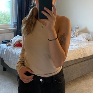 Topp - En topp från nakd i beige. Jättefin och i bra kvalire