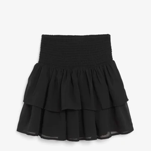 Svart volangkjol - En jättefin volangkjol i storlek 164 men passar absolut en xs/s, inga defekter o endast använd några gånger