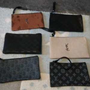 Väskor  - Säljer dessa kopior helt o använda säljer ST vis. 