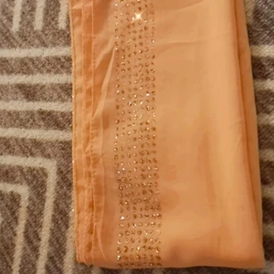 S - En halsduk som glitter och fint det rosa 