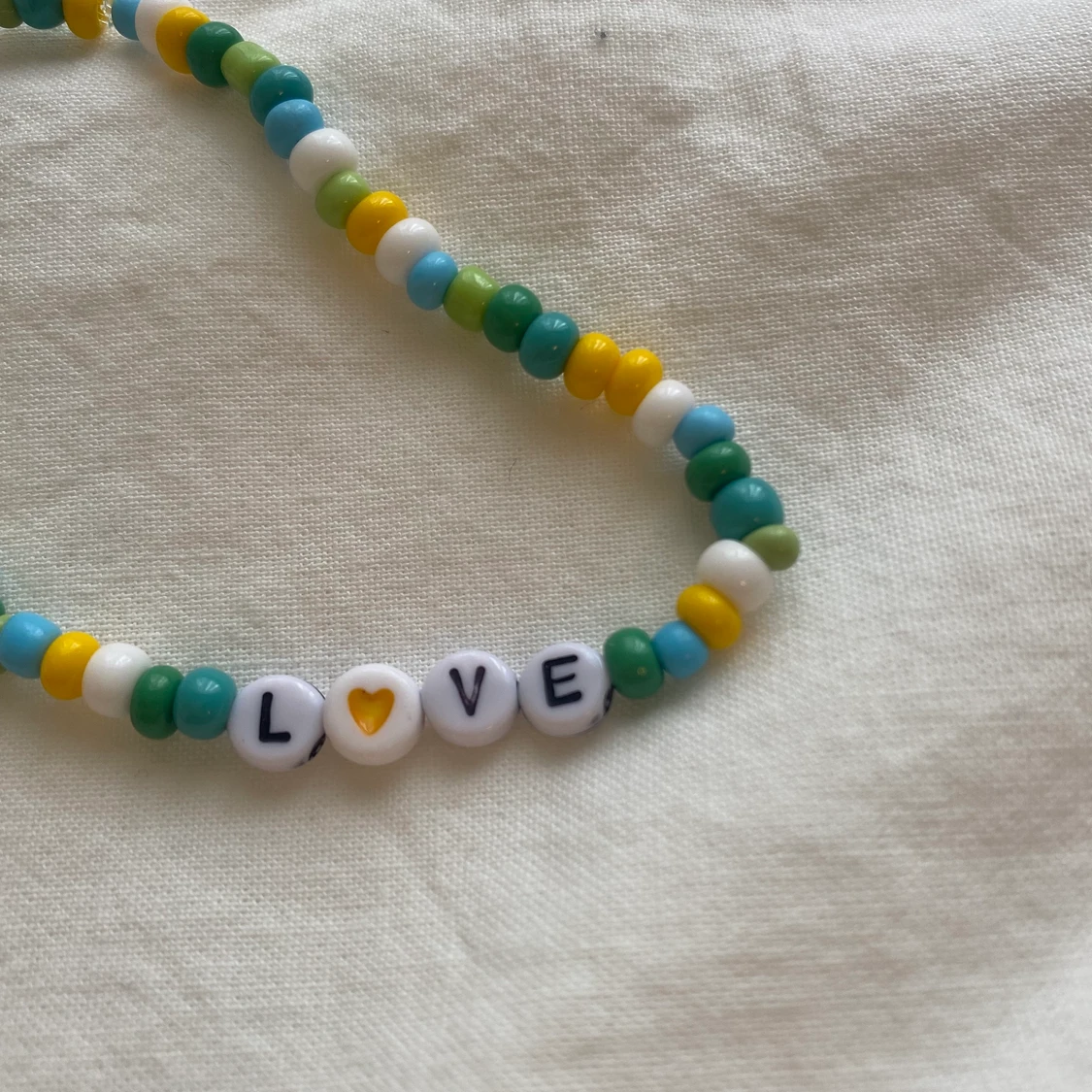 Fotlänk pärlad - 90