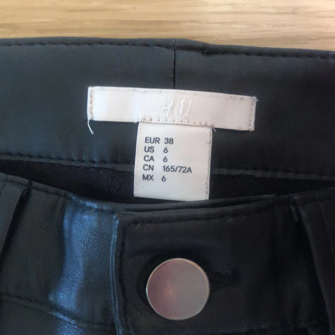 Raka svarta läderbyxor - 91