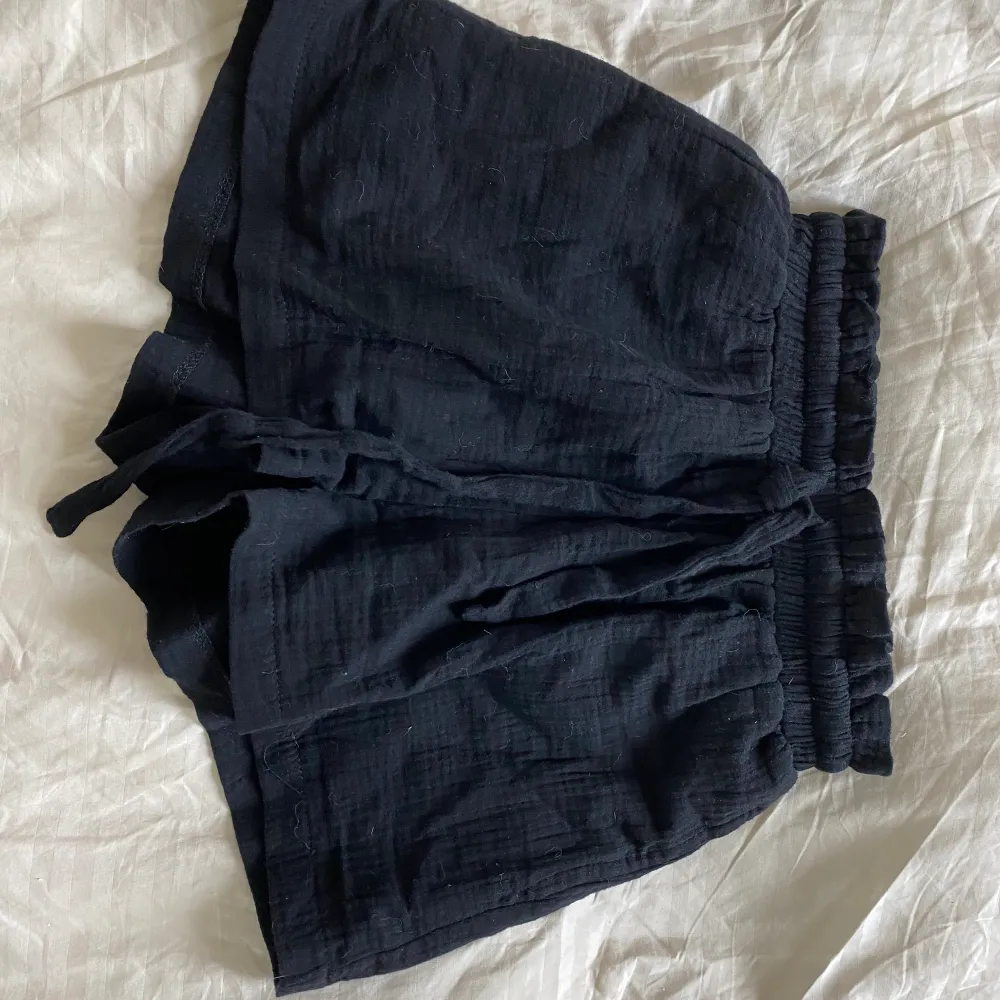 New black shorts from white fox boutique. Never used, still has tag on, high waisted, loose fit and comfortable, cotton material . Shorts.