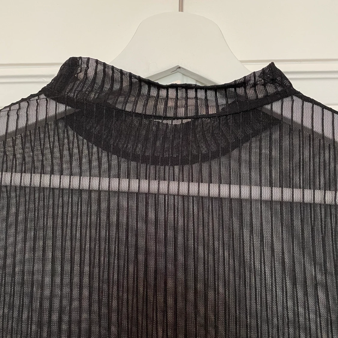 Snygg meshtröja i svart - 90