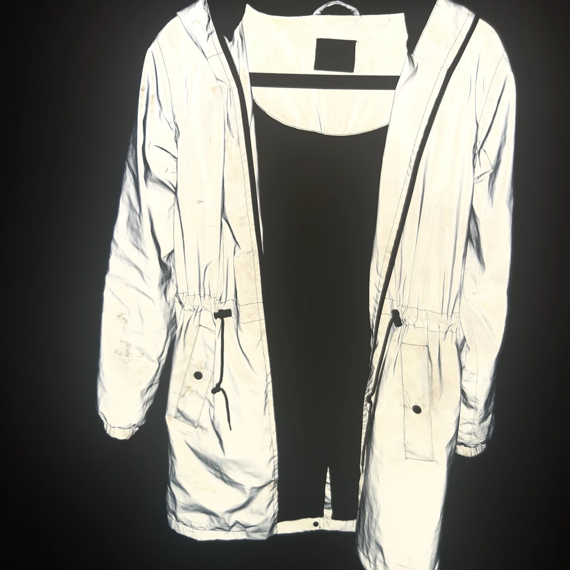 Lång reflex jacka med luva