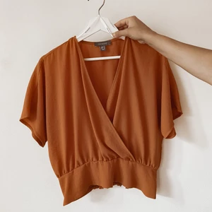 Orange blus - Orange blus - oanvänd. 