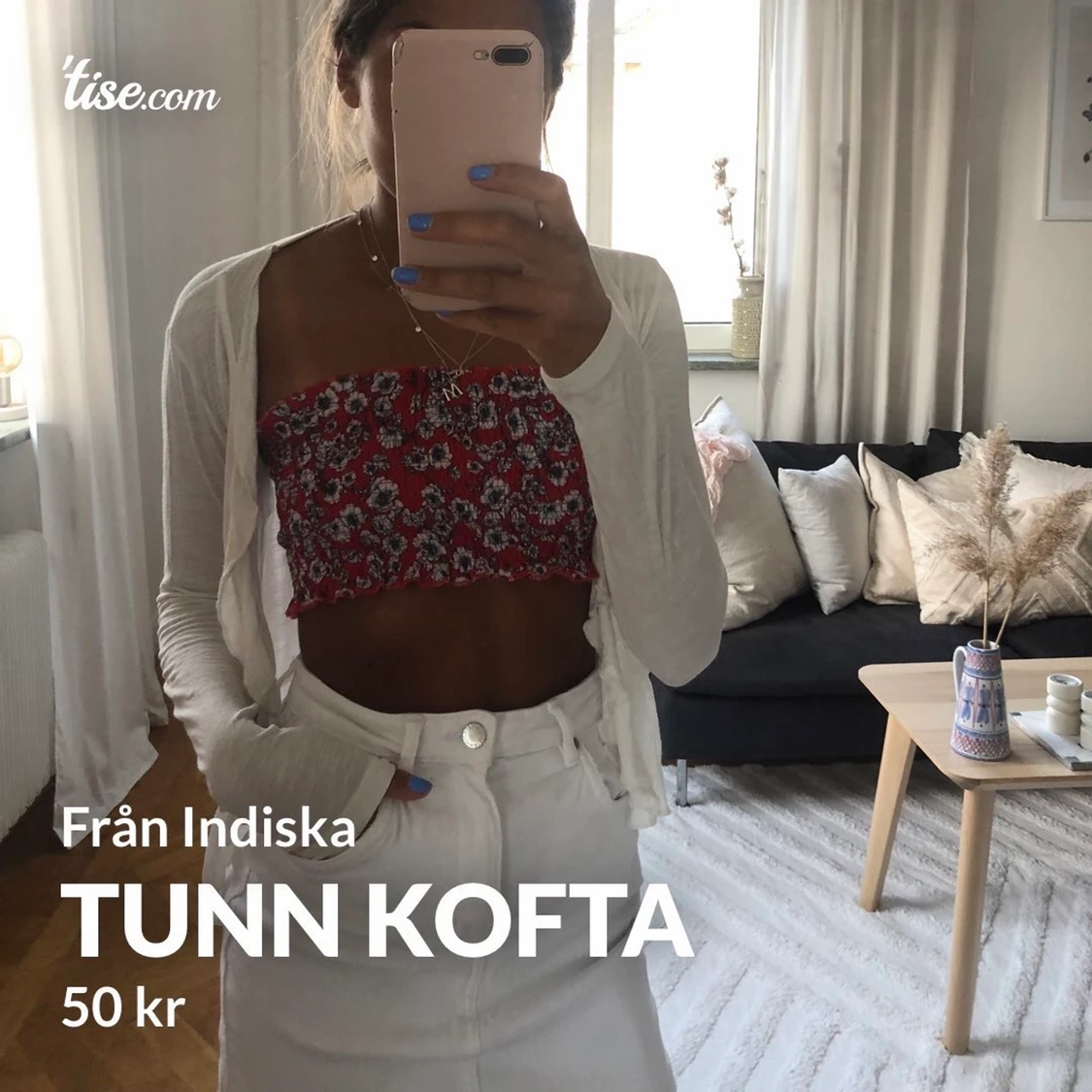 Tunn vit kofta med volang