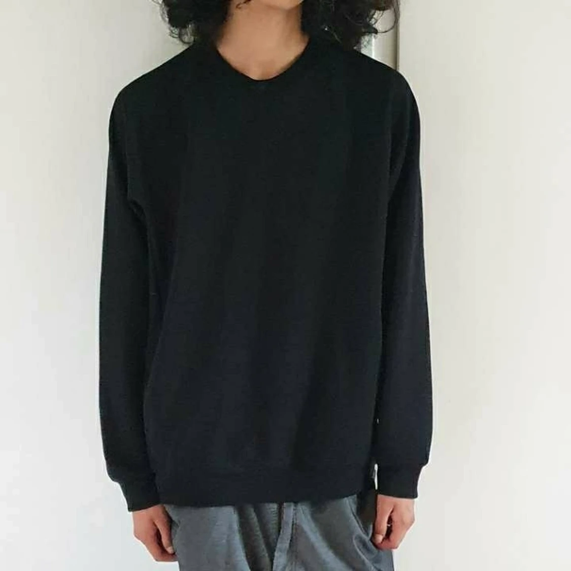 Snygg svart långärmad Uniqlo tröja 