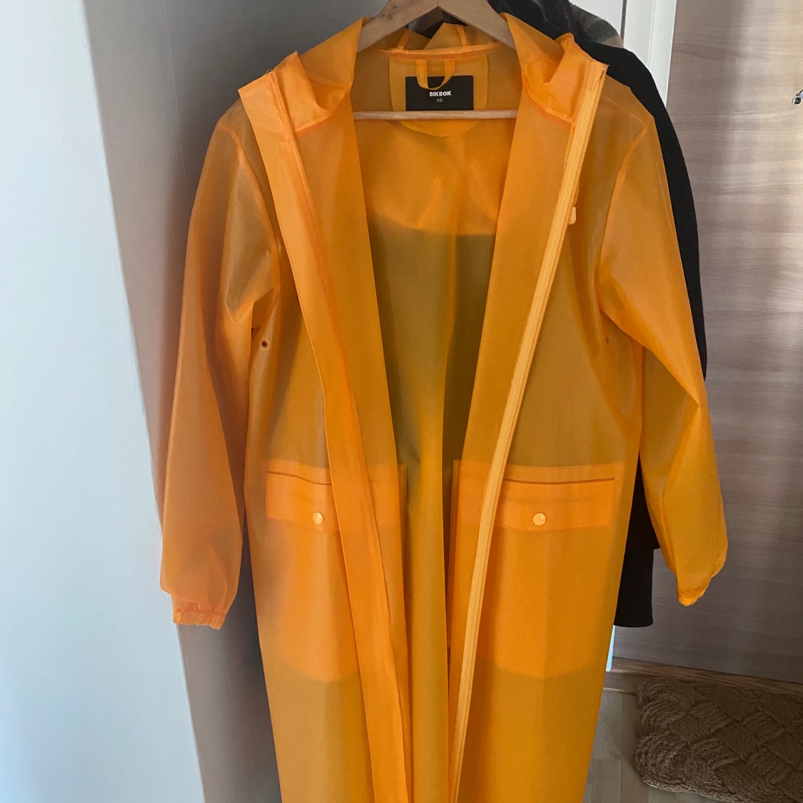 Genomskinlig regnkappa - 91