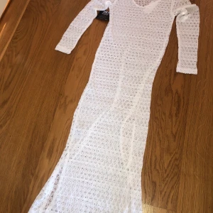 Strand/nät klänning - Ifrån Nelly, ny