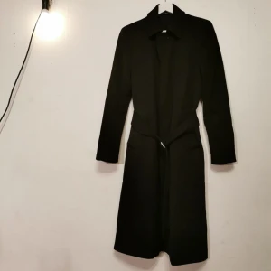 Acne kappa  - Acne 48 Medium Lammull/viskos