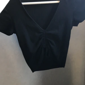 Topp - En topp med scrunch. Använd 1 gång! Kommer inte till användning.