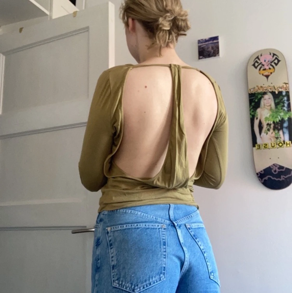 Grön tröja med öppen rygg strl S