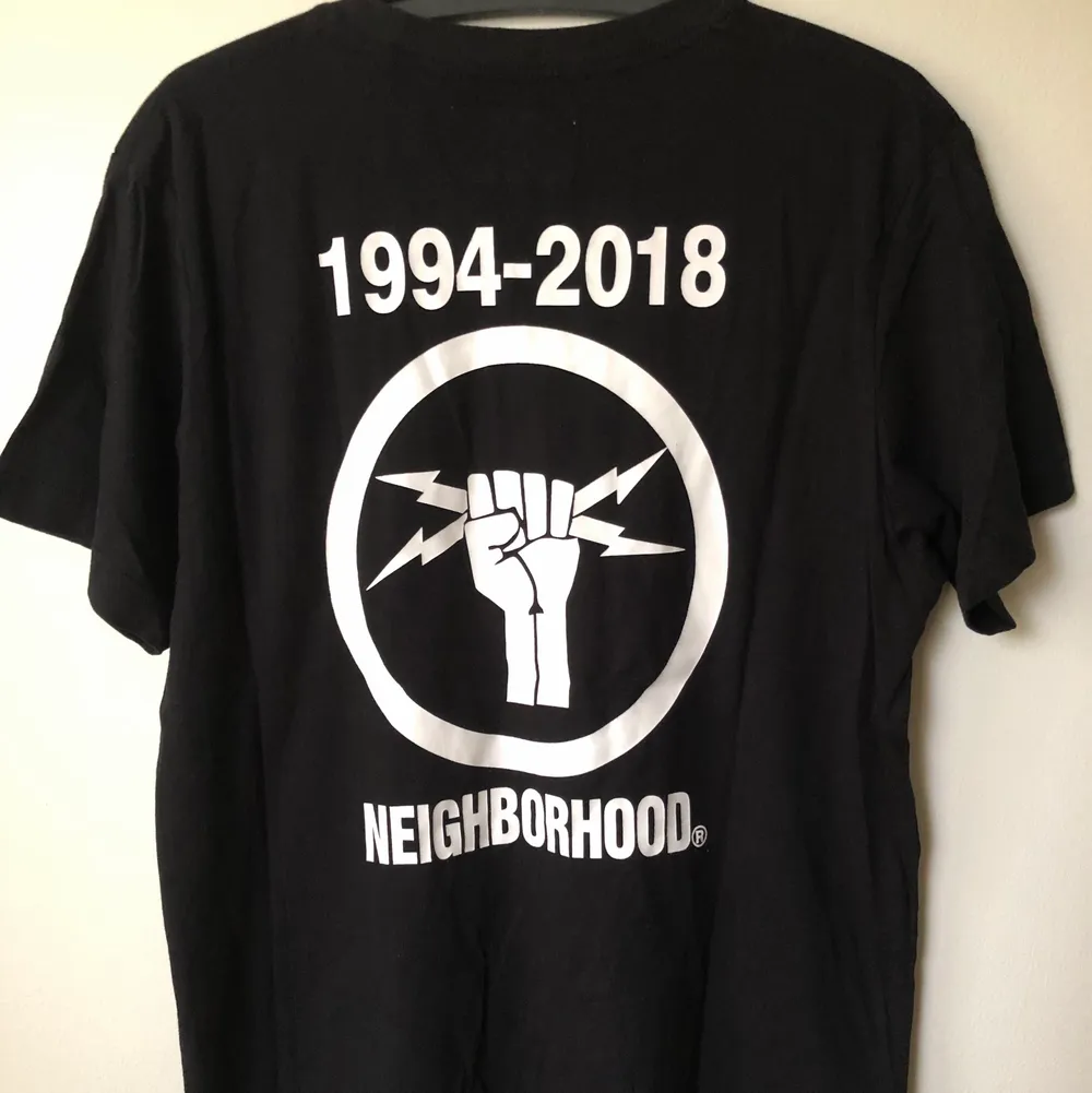 Neighborhood / NBHD Back Fist Logo T-Shirt  Size tag medium, but fits like a men’s small tee.  Great condition, no flaws or damage.  DM if you need exact size measurements.   Buyer pays for all shipping costs. All items sent with tracking number.   No swaps, no trades, no offers. . T-shirts.