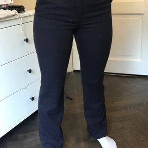 Pants dark blue - Dark blue pants with small burgundy lines