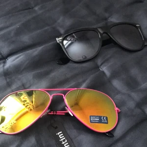 Solglasögon - Två par solglasögon som inte kommer t någon användning! Frakt tillkommer!